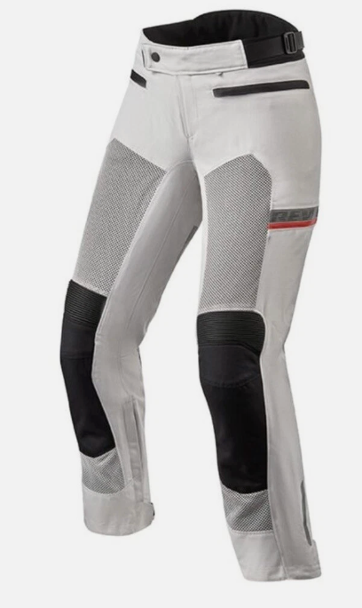 White and black motorcycle pants with mesh panels and protective knee guards, shown on a light gray background.